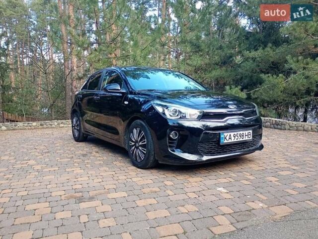 Чорний Кіа Ріо, об'ємом двигуна 1.37 л та пробігом 63 тис. км за 13150 $, фото 2 на Automoto.ua