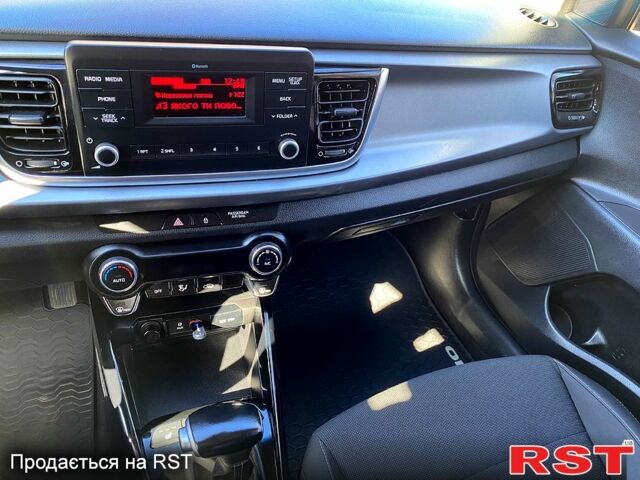 Чорний Кіа Ріо, об'ємом двигуна 1.4 л та пробігом 89 тис. км за 12700 $, фото 12 на Automoto.ua