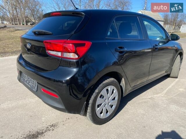 Чорний Кіа Ріо, об'ємом двигуна 1.4 л та пробігом 89 тис. км за 12700 $, фото 22 на Automoto.ua