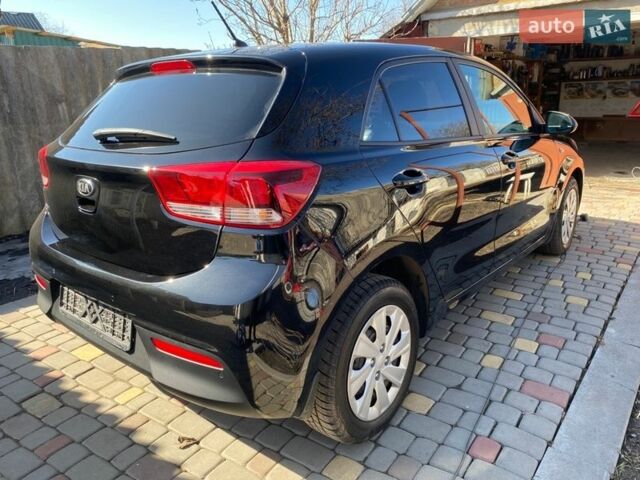 Чорний Кіа Ріо, об'ємом двигуна 1.4 л та пробігом 89 тис. км за 12700 $, фото 25 на Automoto.ua