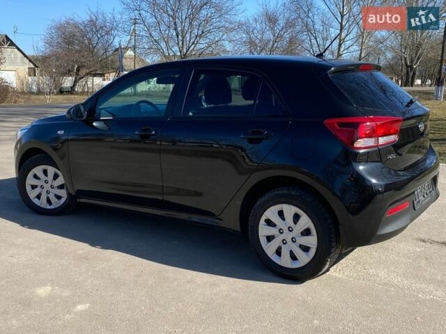 Чорний Кіа Ріо, об'ємом двигуна 1.4 л та пробігом 89 тис. км за 12700 $, фото 15 на Automoto.ua
