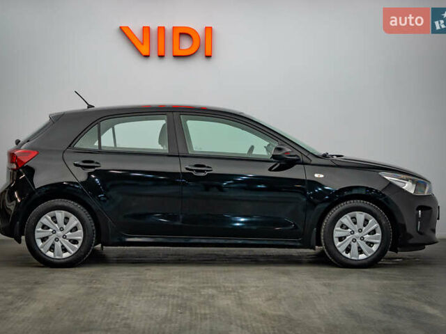 Чорний Кіа Ріо, об'ємом двигуна 1.2 л та пробігом 94 тис. км за 10904 $, фото 3 на Automoto.ua