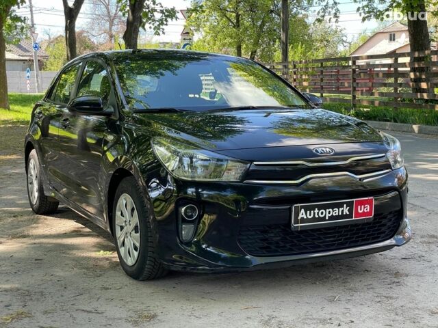 Чорний Кіа Ріо, об'ємом двигуна 1.3 л та пробігом 99 тис. км за 11890 $, фото 3 на Automoto.ua