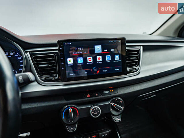 Чорний Кіа Ріо, об'ємом двигуна 1.2 л та пробігом 94 тис. км за 10904 $, фото 14 на Automoto.ua