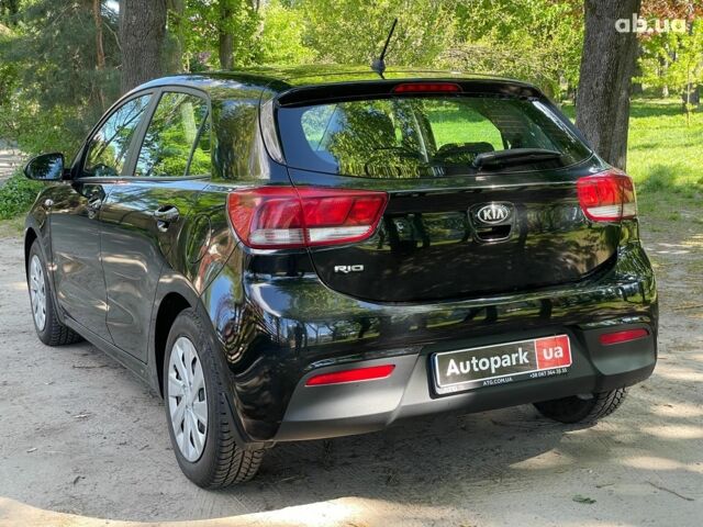 Чорний Кіа Ріо, об'ємом двигуна 1.3 л та пробігом 99 тис. км за 11890 $, фото 11 на Automoto.ua