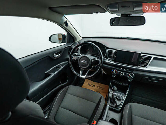 Чорний Кіа Ріо, об'ємом двигуна 1.2 л та пробігом 94 тис. км за 10904 $, фото 10 на Automoto.ua