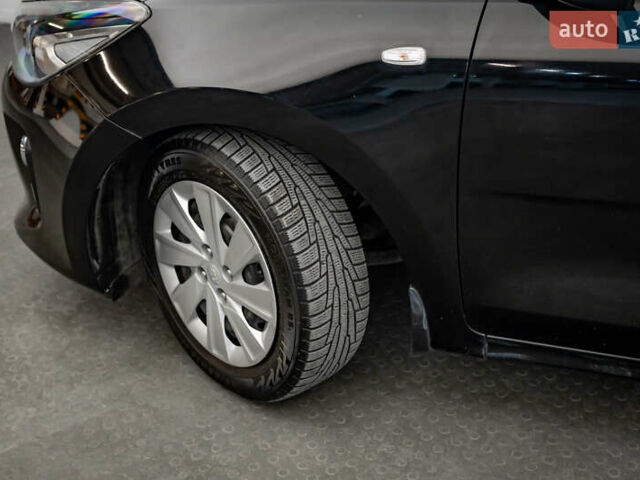 Чорний Кіа Ріо, об'ємом двигуна 1.2 л та пробігом 94 тис. км за 10904 $, фото 7 на Automoto.ua