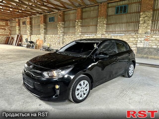 Черный Киа Рио, объемом двигателя 1.3 л и пробегом 106 тыс. км за 2850 $, фото 1 на Automoto.ua