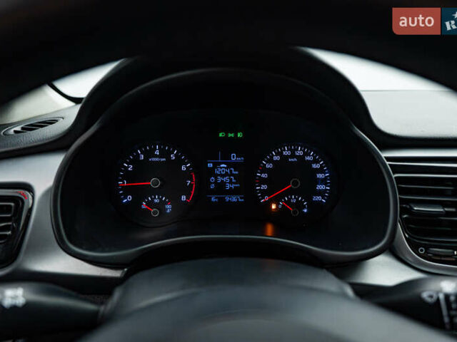 Чорний Кіа Ріо, об'ємом двигуна 1.2 л та пробігом 94 тис. км за 10904 $, фото 12 на Automoto.ua