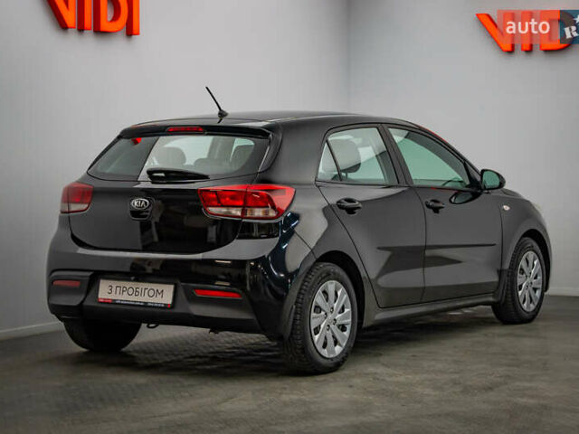 Чорний Кіа Ріо, об'ємом двигуна 1.2 л та пробігом 94 тис. км за 10904 $, фото 1 на Automoto.ua