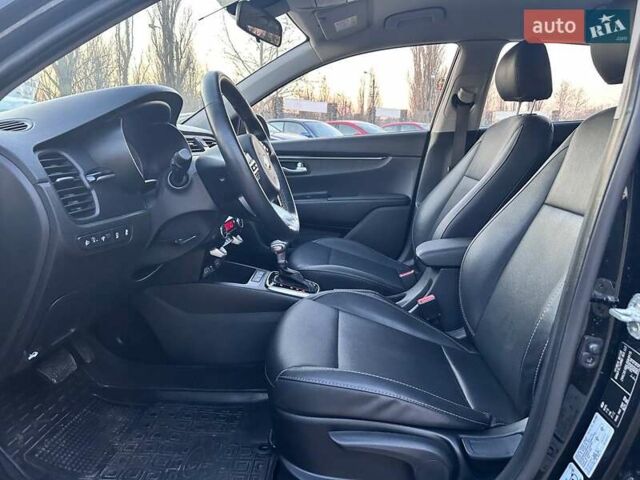 Чорний Кіа Ріо, об'ємом двигуна 1.59 л та пробігом 92 тис. км за 16200 $, фото 13 на Automoto.ua