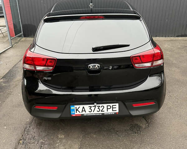 Чорний Кіа Ріо, об'ємом двигуна 1.37 л та пробігом 99 тис. км за 14500 $, фото 5 на Automoto.ua