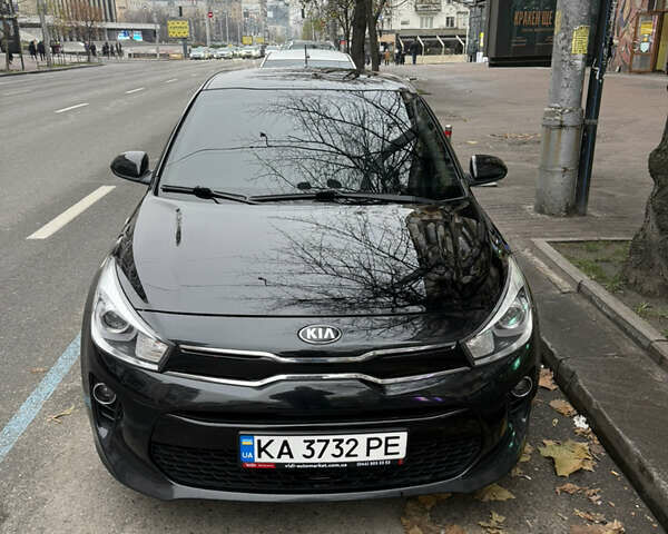 Чорний Кіа Ріо, об'ємом двигуна 1.37 л та пробігом 99 тис. км за 14500 $, фото 1 на Automoto.ua