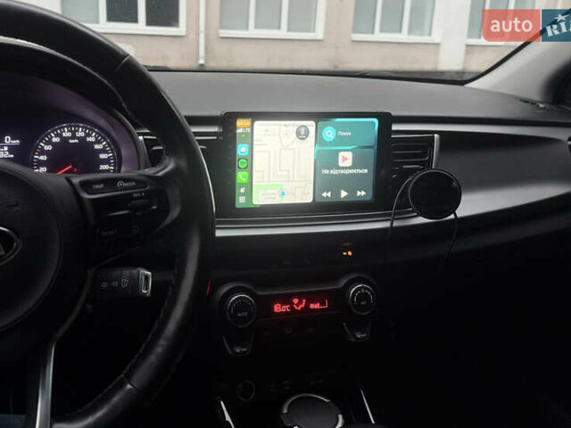 Чорний Кіа Ріо, об'ємом двигуна 1.37 л та пробігом 99 тис. км за 14500 $, фото 6 на Automoto.ua