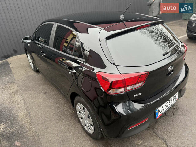 Чорний Кіа Ріо, об'ємом двигуна 1.37 л та пробігом 99 тис. км за 14500 $, фото 3 на Automoto.ua