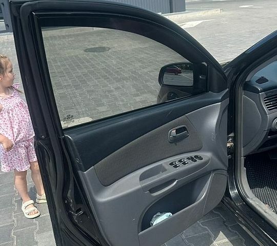 Черный Киа Рио, объемом двигателя 1.4 л и пробегом 213 тыс. км за 5700 $, фото 9 на Automoto.ua