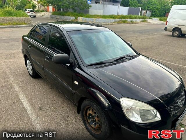 Черный Киа Рио, объемом двигателя 1.4 л и пробегом 252 тыс. км за 3600 $, фото 4 на Automoto.ua