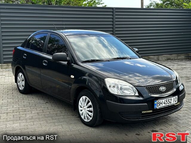 Черный Киа Рио, объемом двигателя 1.4 л и пробегом 250 тыс. км за 4999 $, фото 7 на Automoto.ua