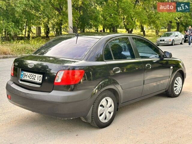 Чорний Кіа Ріо, об'ємом двигуна 1.4 л та пробігом 252 тис. км за 4750 $, фото 15 на Automoto.ua