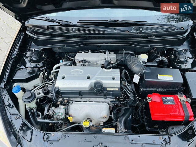 Черный Киа Рио, объемом двигателя 1.4 л и пробегом 297 тыс. км за 3999 $, фото 23 на Automoto.ua