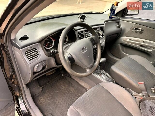 Чорний Кіа Ріо, об'ємом двигуна 1.4 л та пробігом 252 тис. км за 4750 $, фото 17 на Automoto.ua