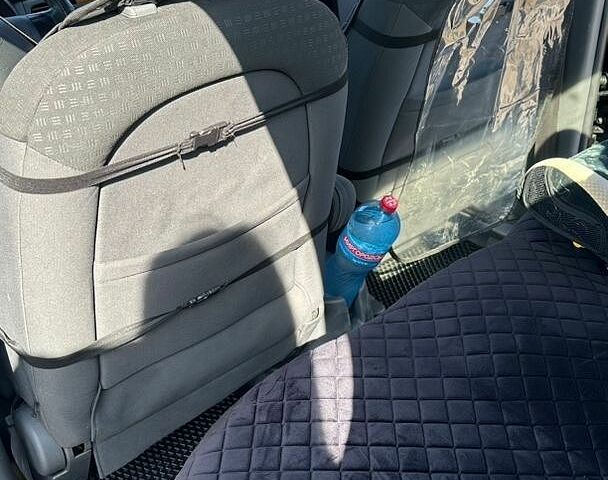 Чорний Кіа Ріо, об'ємом двигуна 1.4 л та пробігом 213 тис. км за 5100 $, фото 22 на Automoto.ua