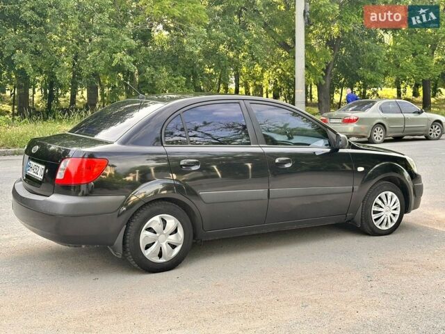 Чорний Кіа Ріо, об'ємом двигуна 1.4 л та пробігом 252 тис. км за 4750 $, фото 14 на Automoto.ua