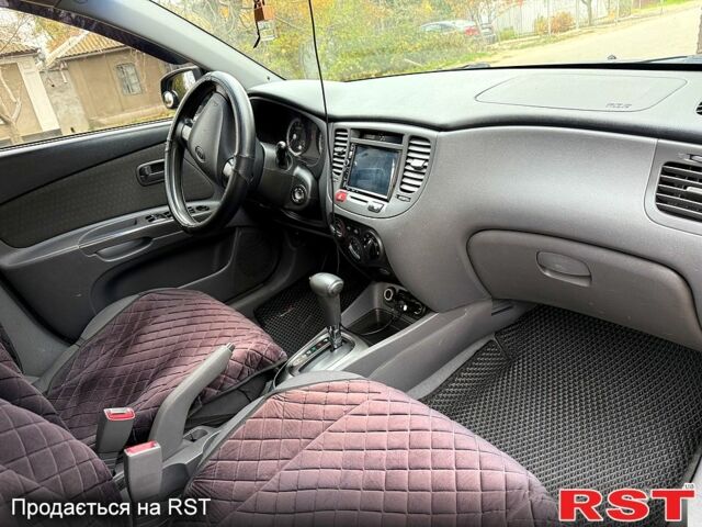 Черный Киа Рио, объемом двигателя 1.4 л и пробегом 199 тыс. км за 5500 $, фото 3 на Automoto.ua