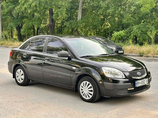 Чорний Кіа Ріо, об'ємом двигуна 1.4 л та пробігом 252 тис. км за 4750 $, фото 10 на Automoto.ua