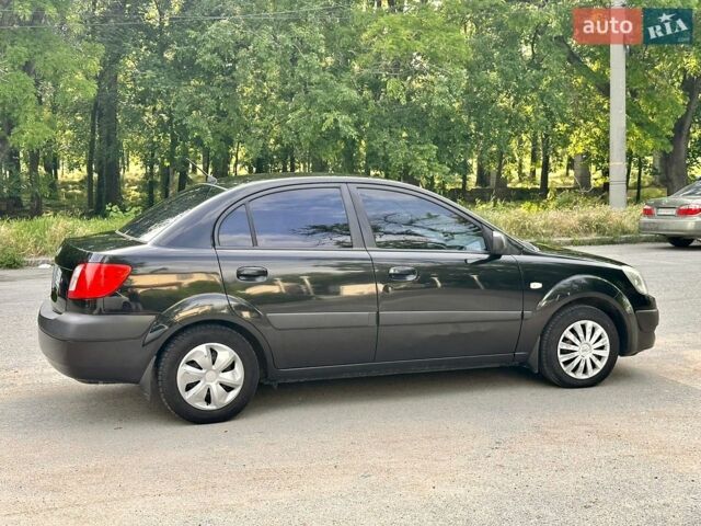 Чорний Кіа Ріо, об'ємом двигуна 1.4 л та пробігом 252 тис. км за 4750 $, фото 13 на Automoto.ua
