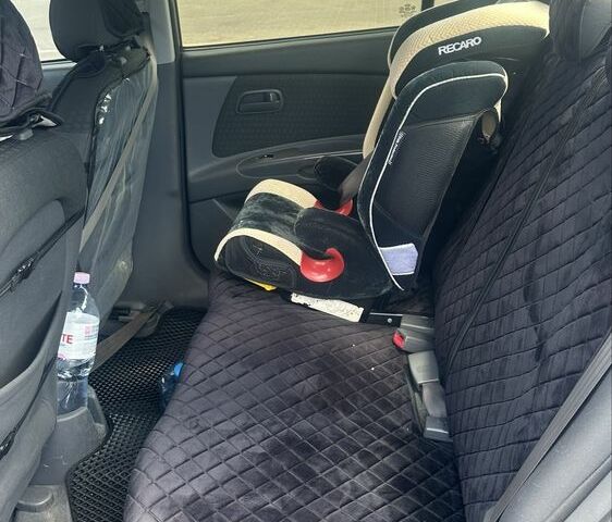 Черный Киа Рио, объемом двигателя 1.4 л и пробегом 213 тыс. км за 5124 $, фото 5 на Automoto.ua