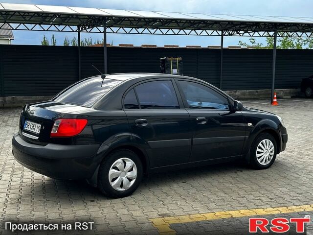 Черный Киа Рио, объемом двигателя 1.4 л и пробегом 250 тыс. км за 4999 $, фото 4 на Automoto.ua