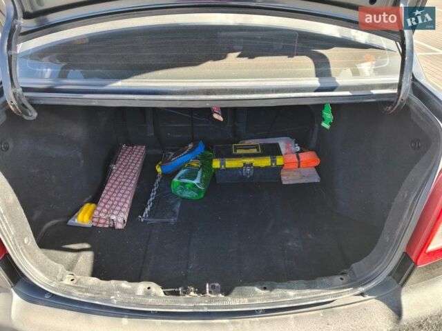 Черный Киа Рио, объемом двигателя 1.4 л и пробегом 187 тыс. км за 4300 $, фото 12 на Automoto.ua