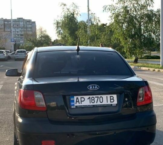 Черный Киа Рио, объемом двигателя 1.4 л и пробегом 210 тыс. км за 4400 $, фото 7 на Automoto.ua