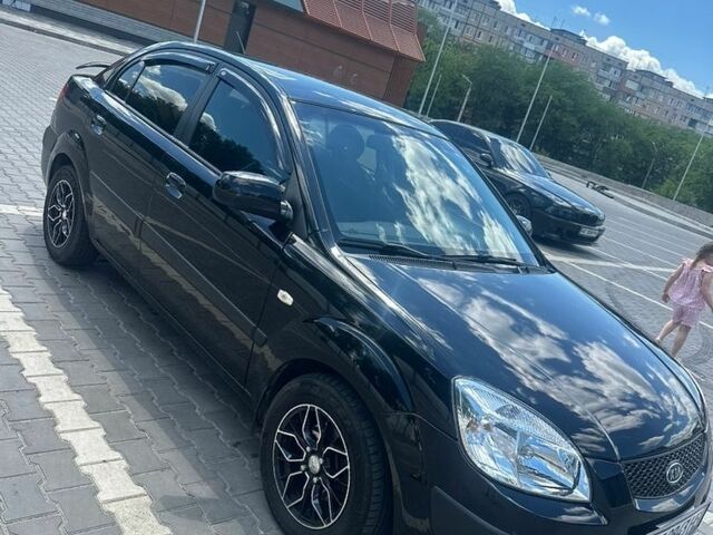 Чорний Кіа Ріо, об'ємом двигуна 1.4 л та пробігом 213 тис. км за 5100 $, фото 7 на Automoto.ua