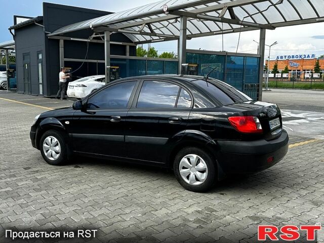Черный Киа Рио, объемом двигателя 1.4 л и пробегом 250 тыс. км за 4999 $, фото 2 на Automoto.ua