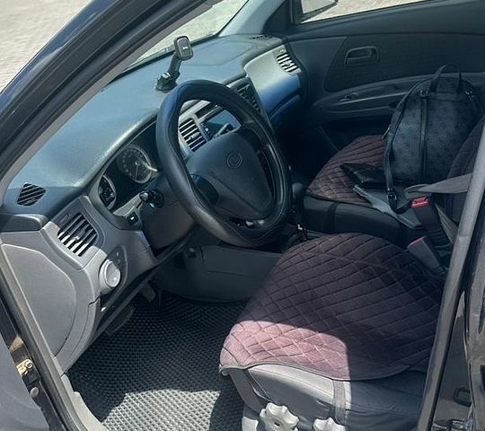 Черный Киа Рио, объемом двигателя 1.4 л и пробегом 213 тыс. км за 5700 $, фото 8 на Automoto.ua