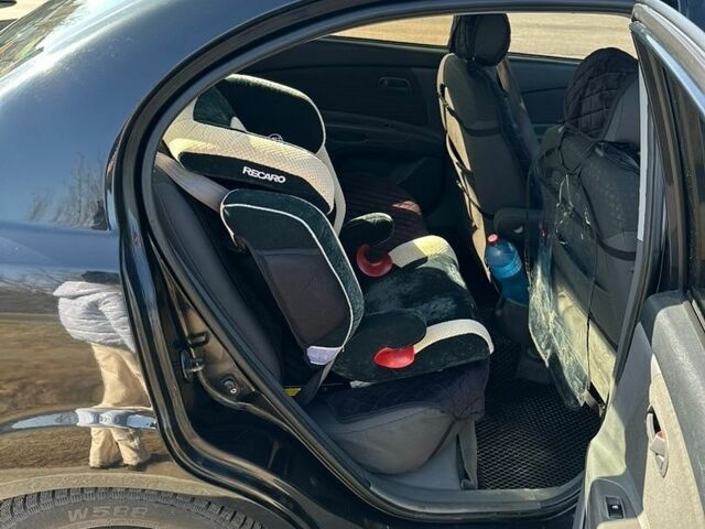 Чорний Кіа Ріо, об'ємом двигуна 1.4 л та пробігом 213 тис. км за 5100 $, фото 23 на Automoto.ua