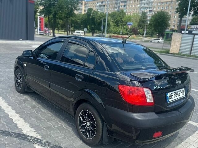Чорний Кіа Ріо, об'ємом двигуна 1.4 л та пробігом 213 тис. км за 5100 $, фото 3 на Automoto.ua