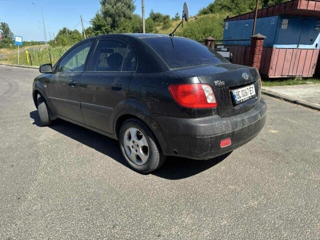 Черный Киа Рио, объемом двигателя 1.4 л и пробегом 200 тыс. км за 3400 $, фото 2 на Automoto.ua
