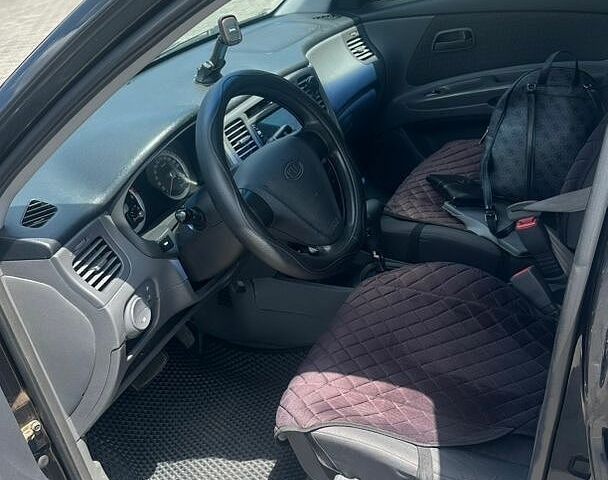 Чорний Кіа Ріо, об'ємом двигуна 1.4 л та пробігом 213 тис. км за 5100 $, фото 8 на Automoto.ua