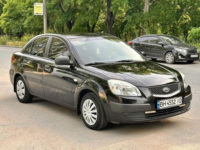 Чорний Кіа Ріо, об'ємом двигуна 1.4 л та пробігом 252 тис. км за 4750 $, фото 9 на Automoto.ua