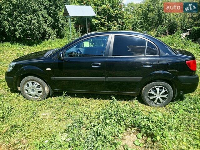 Черный Киа Рио, объемом двигателя 1.4 л и пробегом 350 тыс. км за 3100 $, фото 5 на Automoto.ua