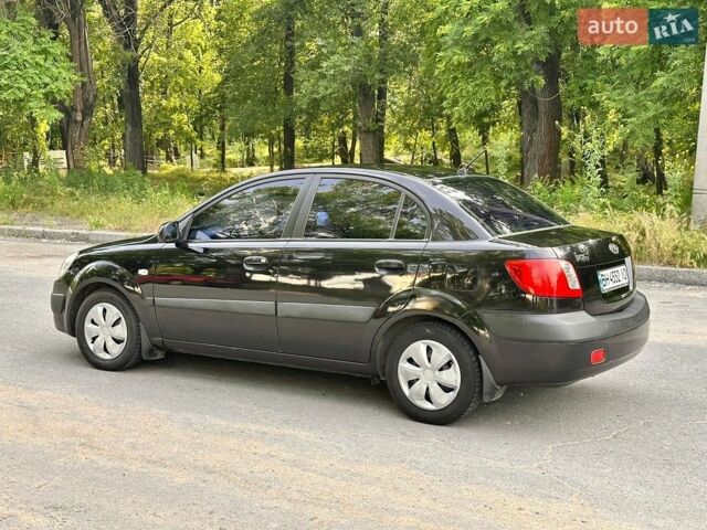 Чорний Кіа Ріо, об'ємом двигуна 1.4 л та пробігом 252 тис. км за 4750 $, фото 7 на Automoto.ua