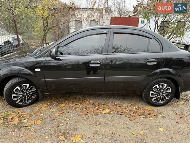 Чорний Кіа Ріо, об'ємом двигуна 1.4 л та пробігом 200 тис. км за 5000 $, фото 1 на Automoto.ua