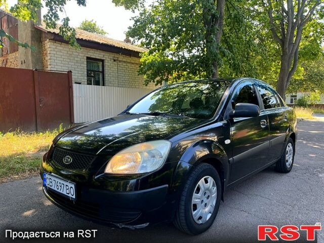 Чорний Кіа Ріо, об'ємом двигуна 1.4 л та пробігом 235 тис. км за 3200 $, фото 8 на Automoto.ua
