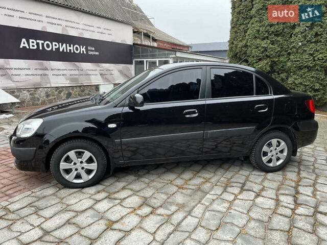Чорний Кіа Ріо, об'ємом двигуна 1.4 л та пробігом 55 тис. км за 6800 $, фото 4 на Automoto.ua
