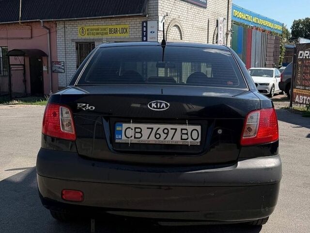 Черный Киа Рио, объемом двигателя 1.4 л и пробегом 235 тыс. км за 3200 $, фото 7 на Automoto.ua