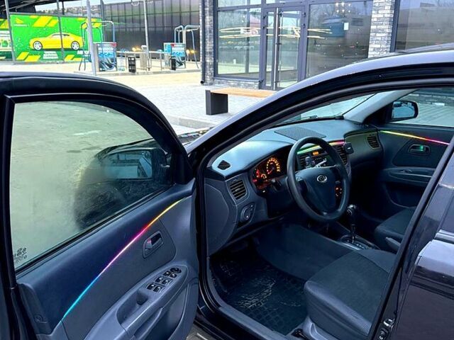 Чорний Кіа Ріо, об'ємом двигуна 1.4 л та пробігом 230 тис. км за 5800 $, фото 7 на Automoto.ua