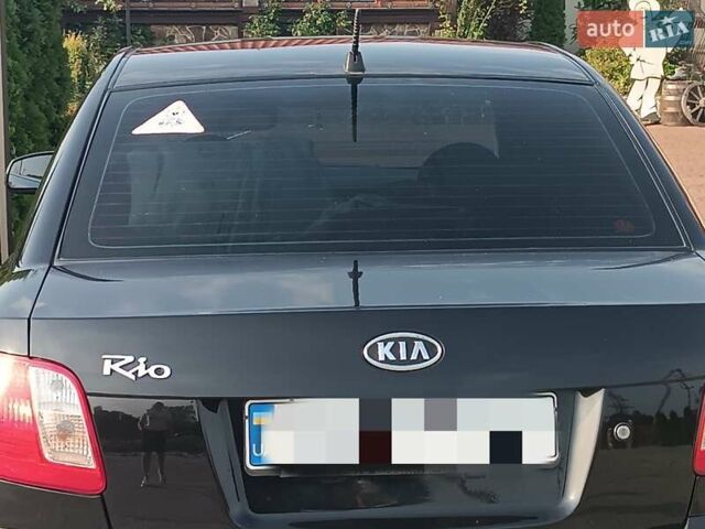 Черный Киа Рио, объемом двигателя 1.4 л и пробегом 196 тыс. км за 4800 $, фото 2 на Automoto.ua